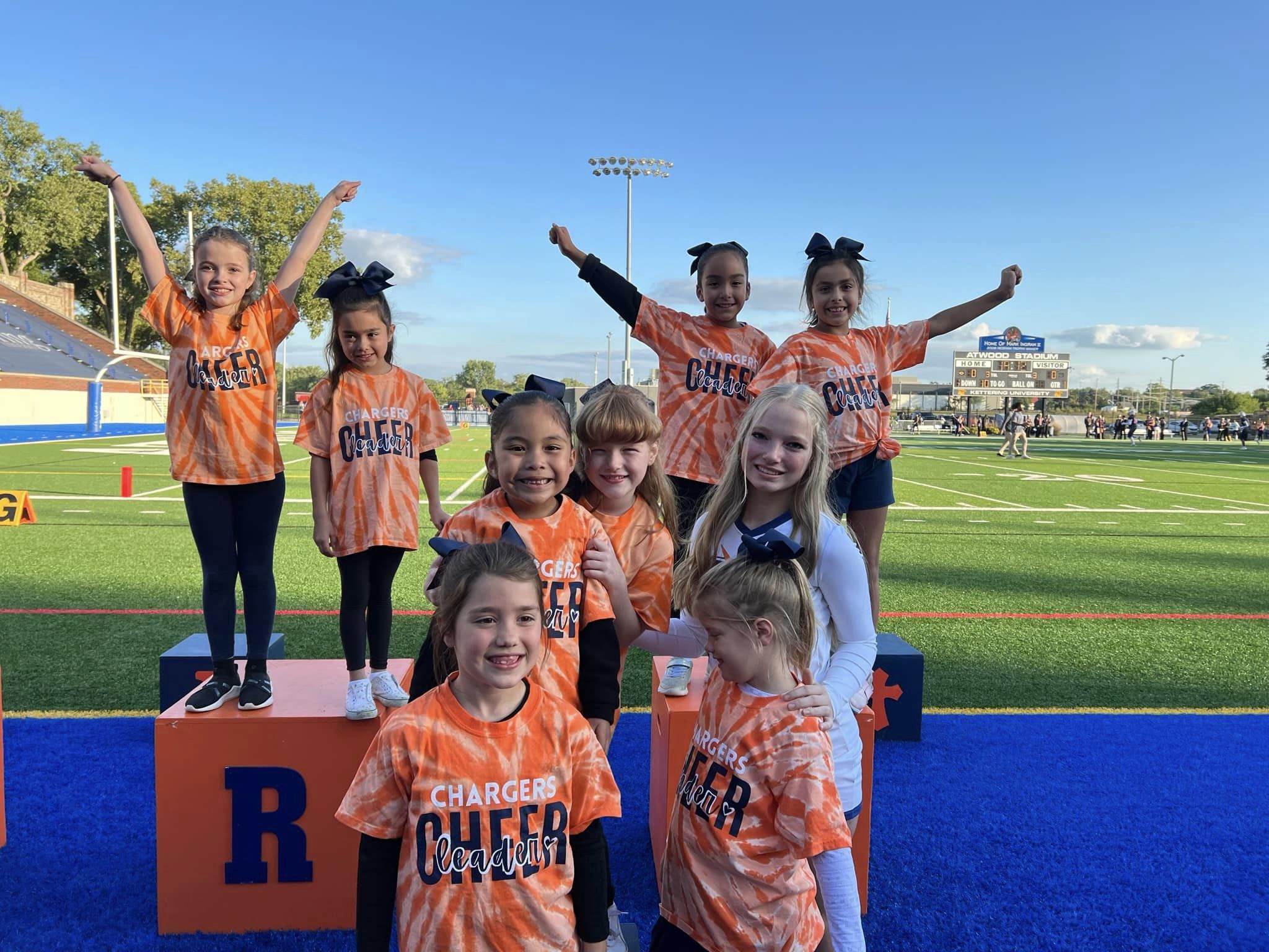 Some of our Holy Rosary students got to practice and then cheer with the Powers...