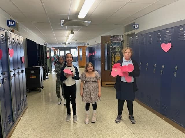 Service squad made Valentine's and them decorated the school with them....